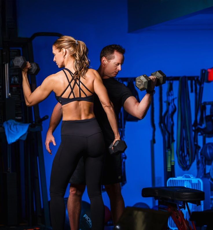 Drive coaches training with dumbbells