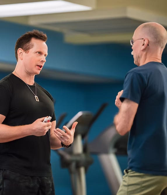 John talking with a client